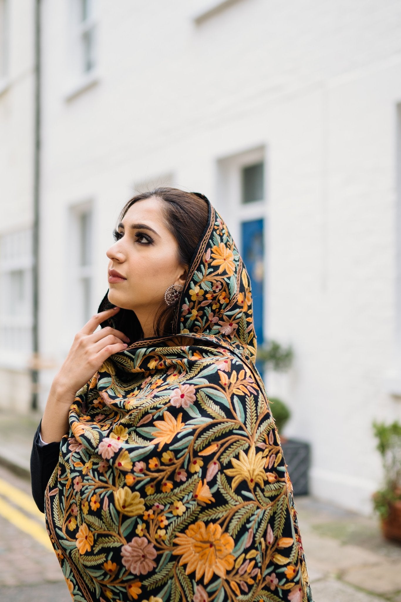 Woman wearing patterned hand embroidered stole