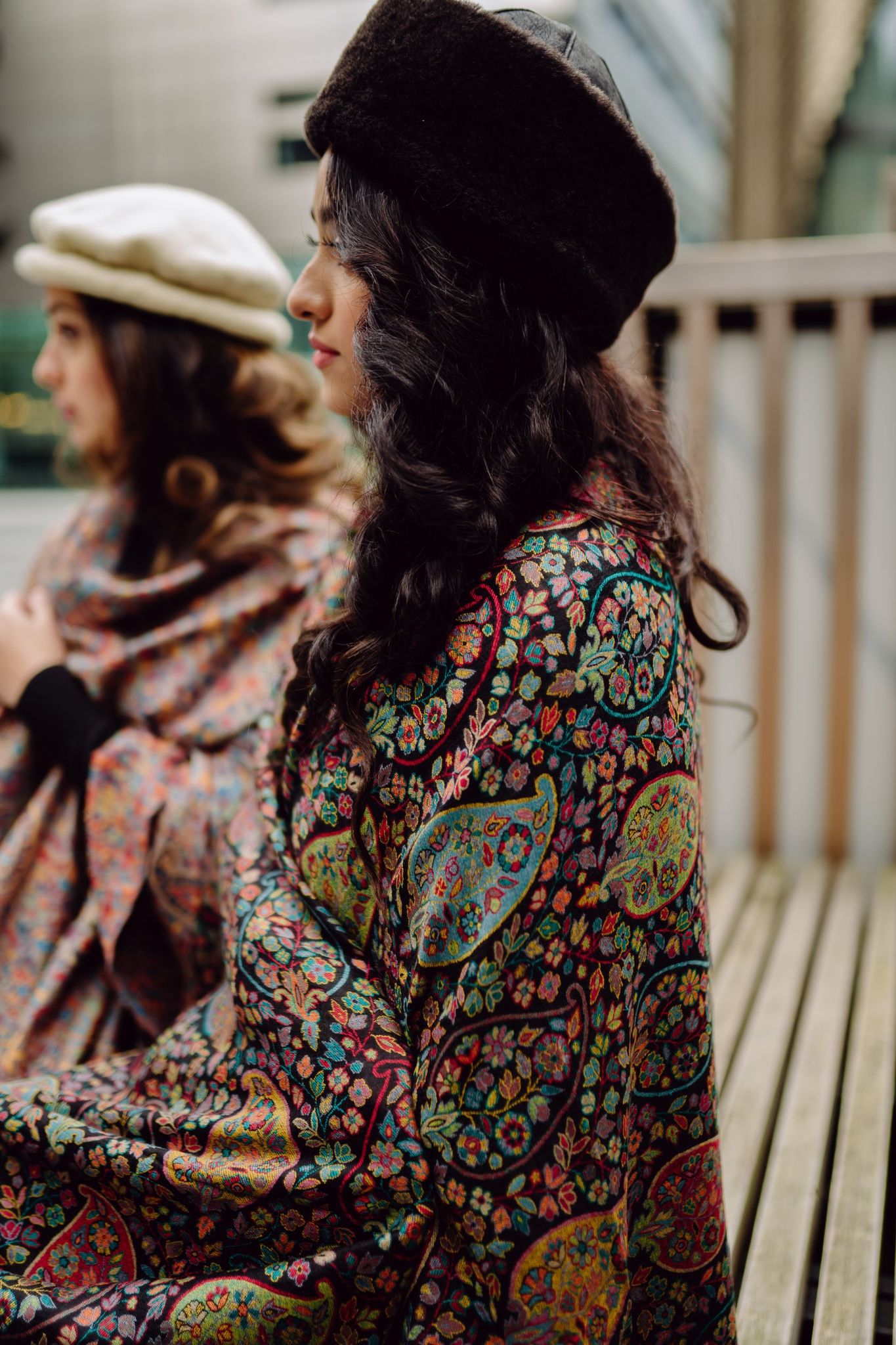 Woman wearing a patterned kani shawl