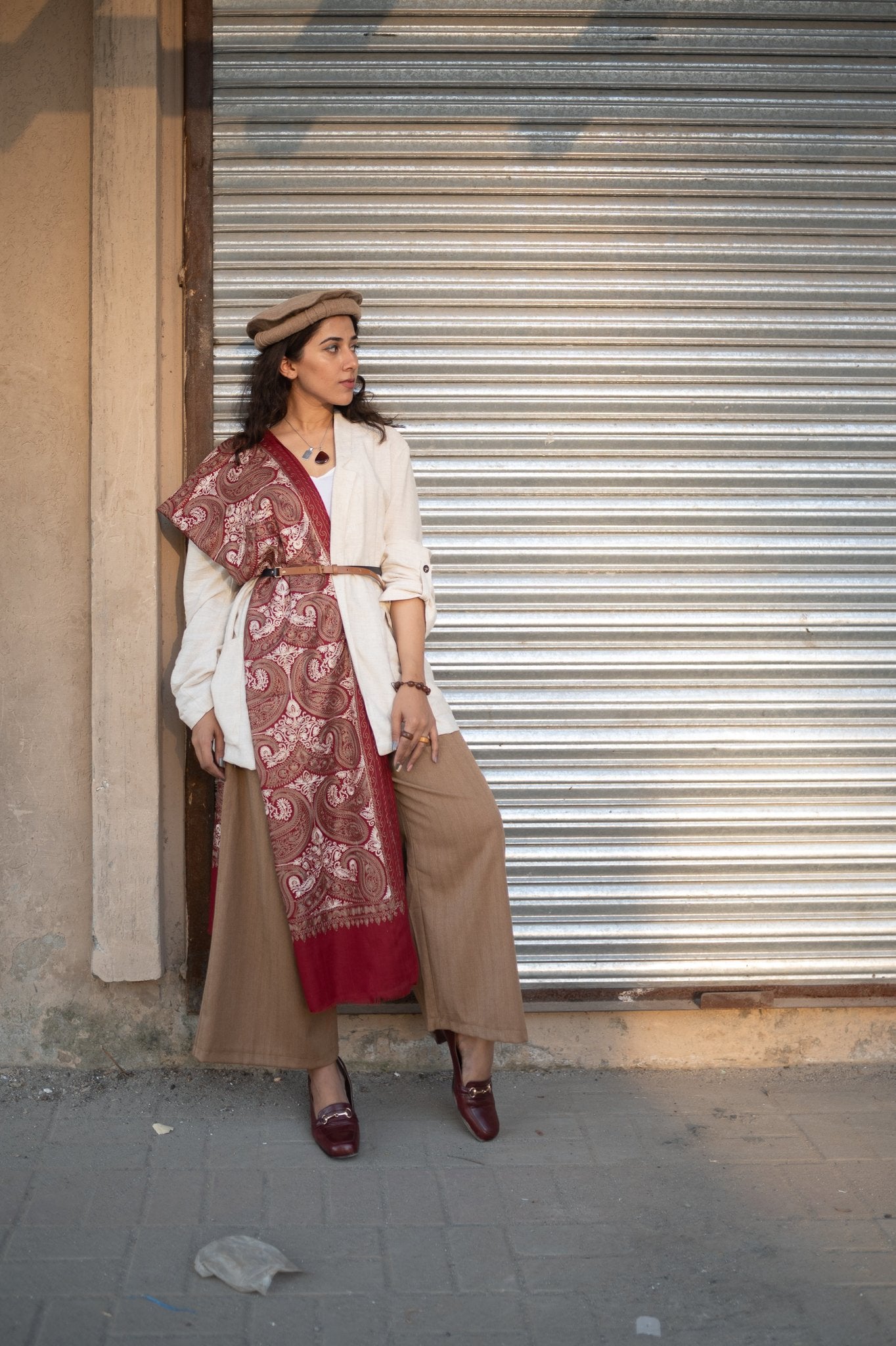 Woman wearing red nalki embroidered shawl